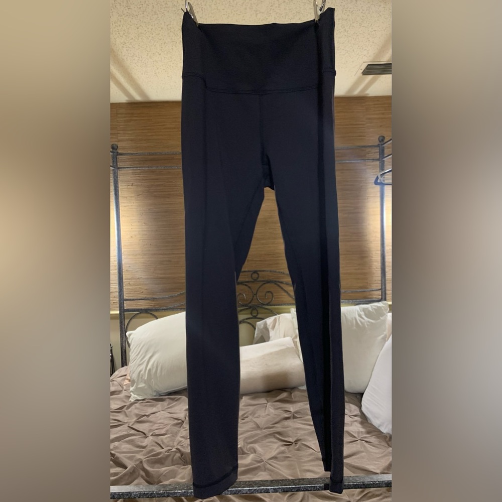 Lululemon Black Sexy leggings Size 8 and they Perk up your behind!